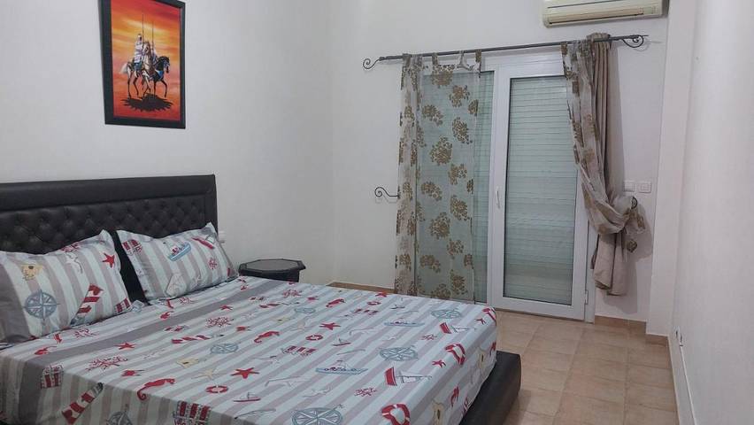 Appartement de vacances pour 5 personnes, avec jardin ainsi que piscine et vue