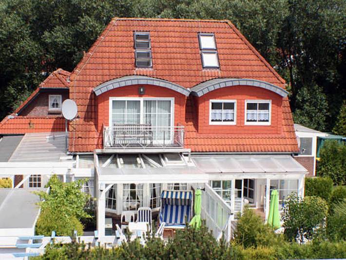Ferienhaus für 7 Personen, mit Balkon und Sauna sowie Garten und Ausblick, kinderfreundlich in Carolinensiel