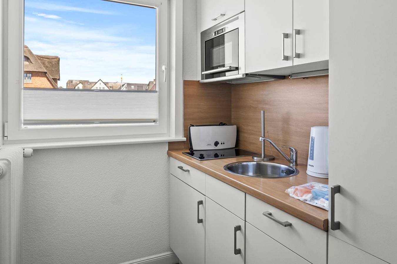 Ganze Wohnung, Gemütliche Zwei-Zimmer-Ferienwohnung im Obergeschoss mit Meerblick in Wenningstedt, Sylt