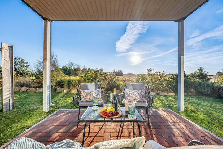 Ferienwohnung für 4 Personen, mit Terrasse und Garten sowie Ausblick in Westerdeichstrich