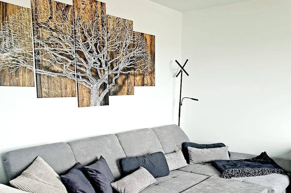 Ganze Wohnung, Moderne Ferienwohnung mit Balkon direkt an der Peene in Sauzin, Usedomer Norden