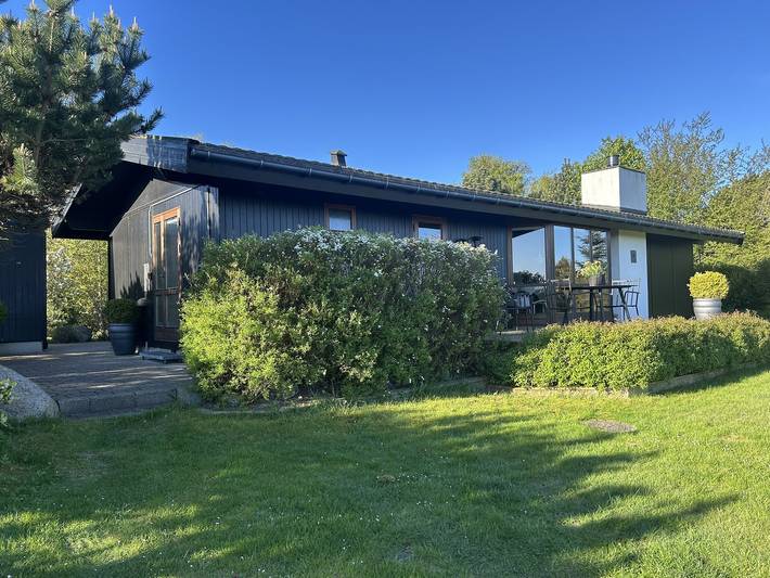 Ferienhaus für 4 Personen, mit Ausblick und Terrasse sowie Garten und Seeblick