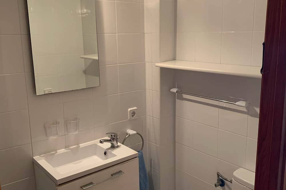 Apartamento entero, Apartamento con piscina, jardines compartidos y vistas al mar in Arenal d'en Castell, Es Mercadal