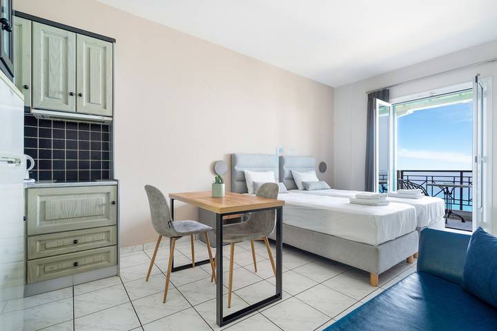 Entire studio, Apartment in a Hotel 'Sunset Premium Studio 5' with Sea View, Shared Pool, & Wi-Fi in Agios Nikitas, Greece