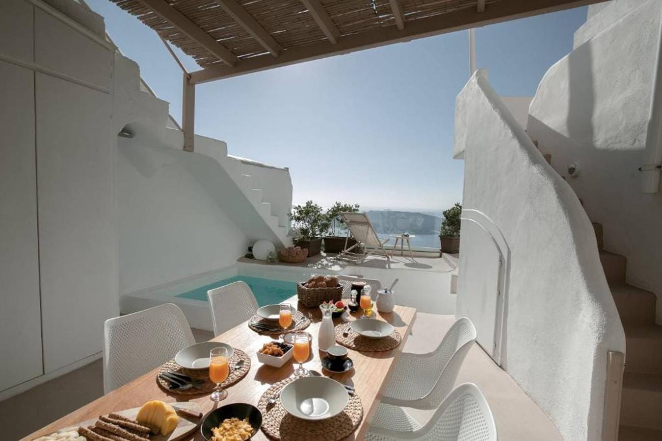 Dazzling Santorini Villa | Villa Aragon | 3 Bedrooms | Children under 12 years old are not allowed | Breathtaking Caldera Viwes | Sun Deck | Outdoor Jacuzzi | Shaded Terrace with Outdoor Dining Area | Indoor Cave Jacuzzi | Agiou Mina, Fira in Firostefani, Thera
