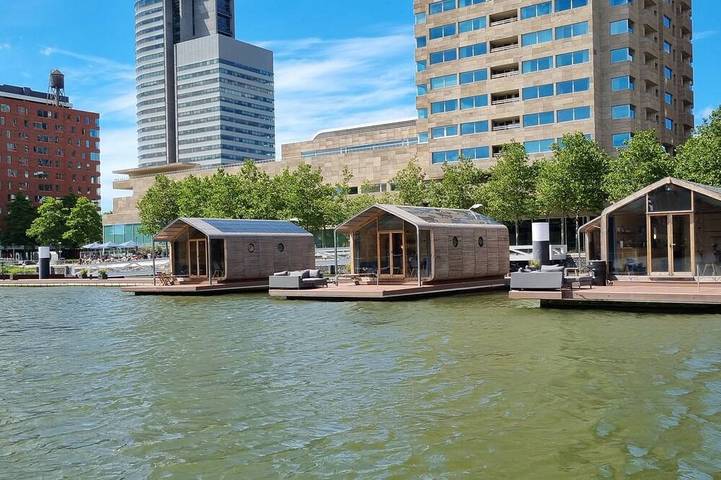 Wrap Boat No. 2 at Floating Rotterdam Rijnhaven with open swimmingpool nextdoor in Rotterdam, Olanda Meridionale