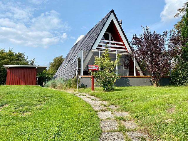 Ferienhaus für 4 Personen, mit Balkon und Terrasse sowie Garten