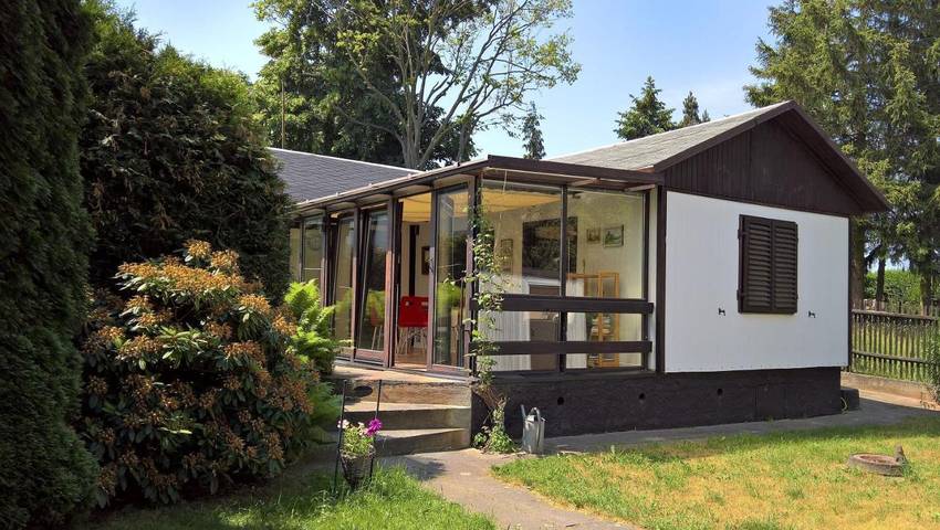 Ferienhaus für 2 Personen, mit Terrasse und Garten sowie Pool