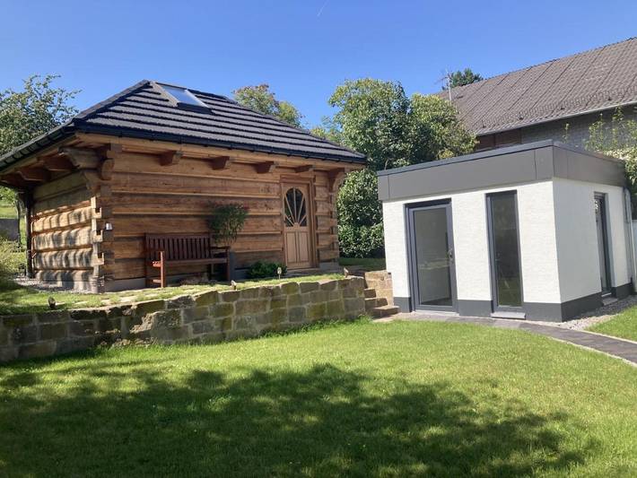 Ferienwohnung für 2 Personen, mit Whirlpool und Garten sowie Sauna und Ausblick