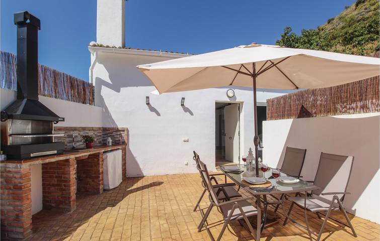 Appartement au bord de la piscine avec climatisation et parking in Sayalonga, Cordillera Penibética