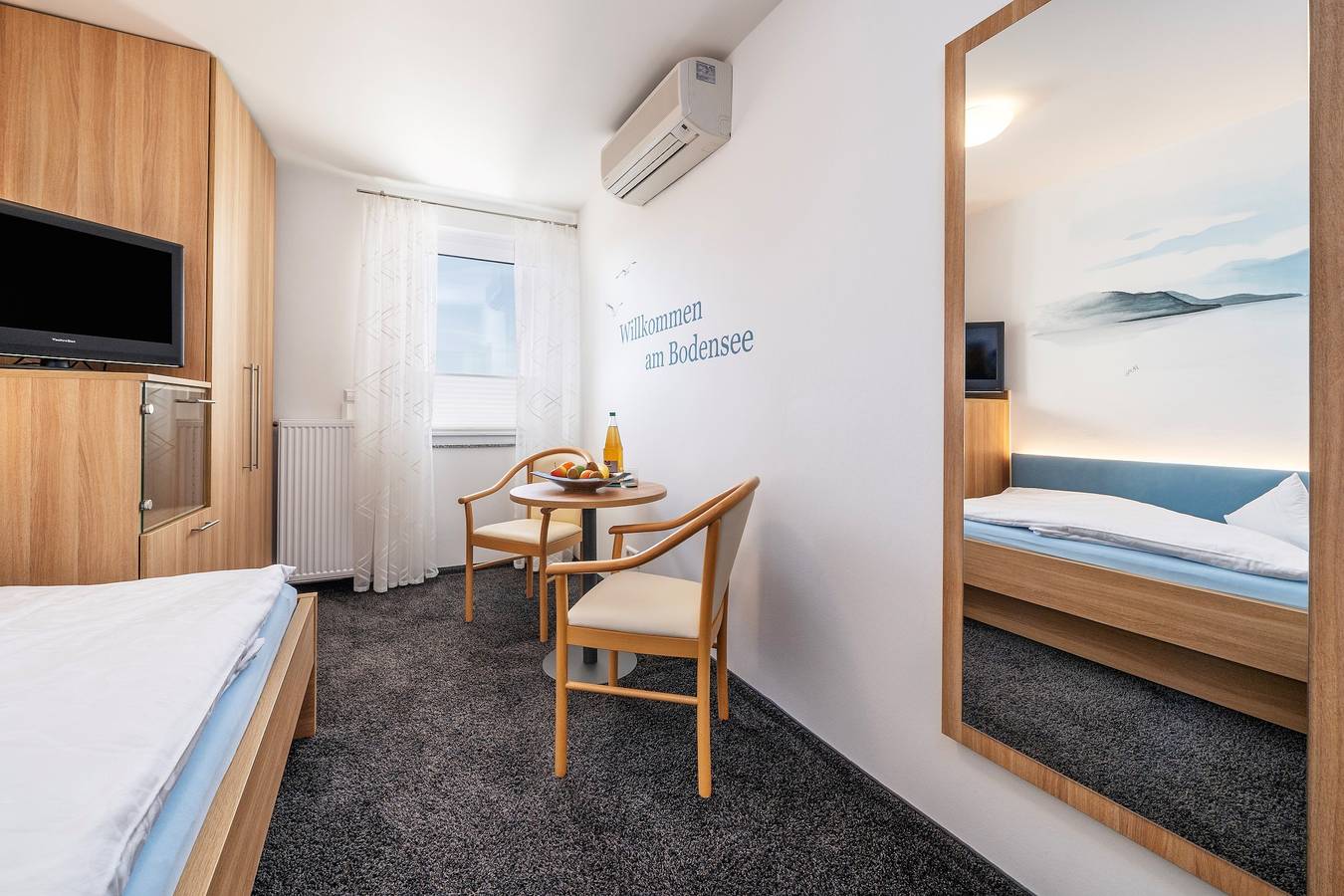 Zimmer '104' mit Gemeinschaftsgarten, Wi-Fi und Klimaanlage in Hagnau am Bodensee, Region Bodensee-Oberschwaben