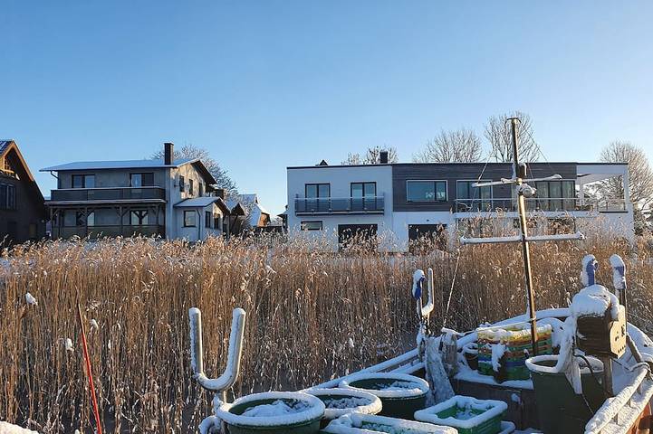 Appartement entier, Modern vacation apartment with balcony directly on the Peene in Ziemitz, Sauzin