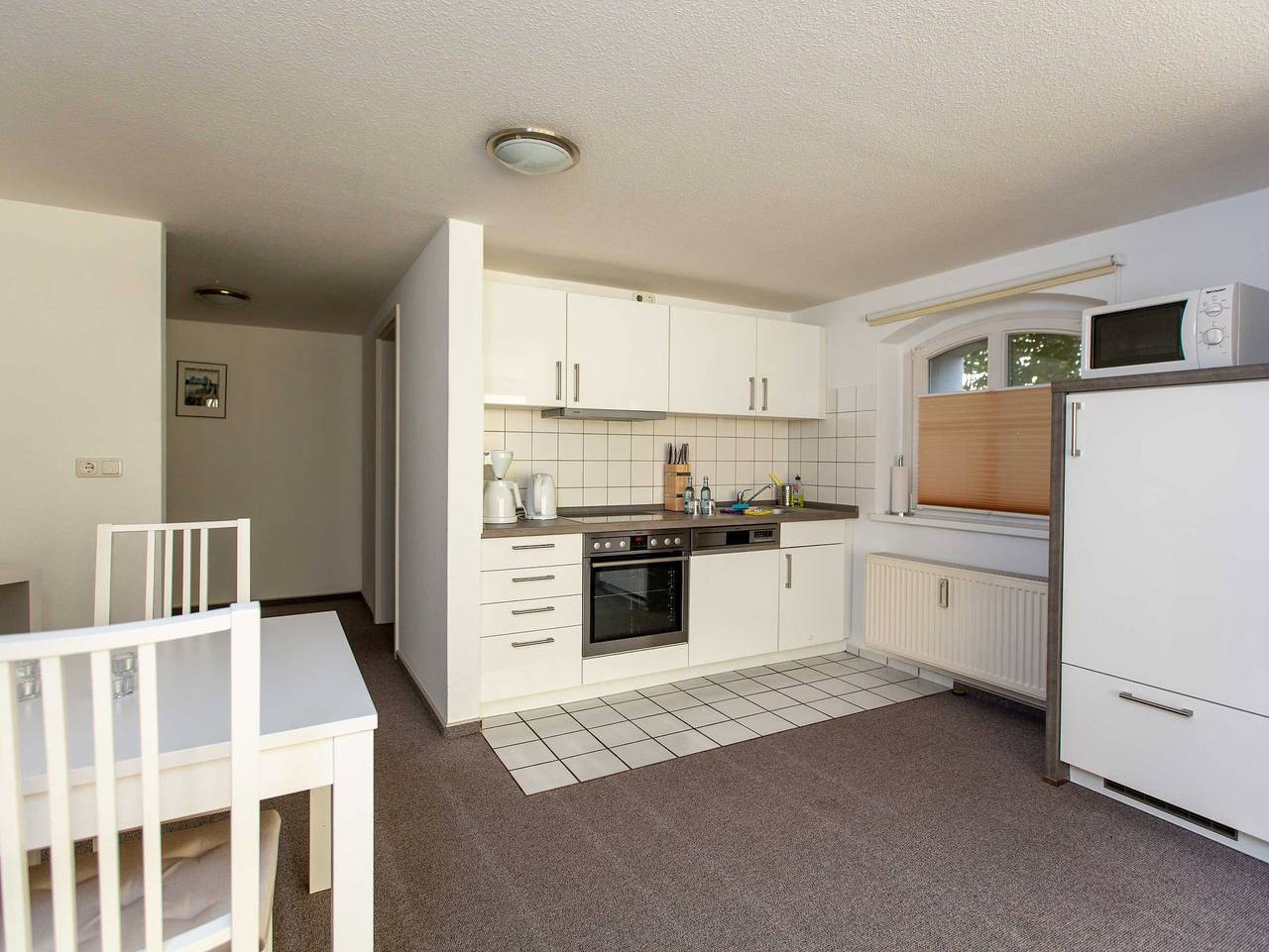 Apartamento entero, Apartamento 'Blanck 2' con vistas al lago, terraza privada y Wi-Fi in Malchow, Fleesensee