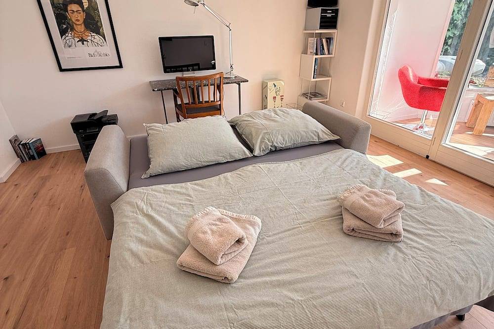 Entire apartment, A Retreat on Lake Ammersee, 2-room apartment, 87 square meters, 5 minutes to the lake, relaxing garden, pet-friendly in Utting am Ammersee, Ammersee