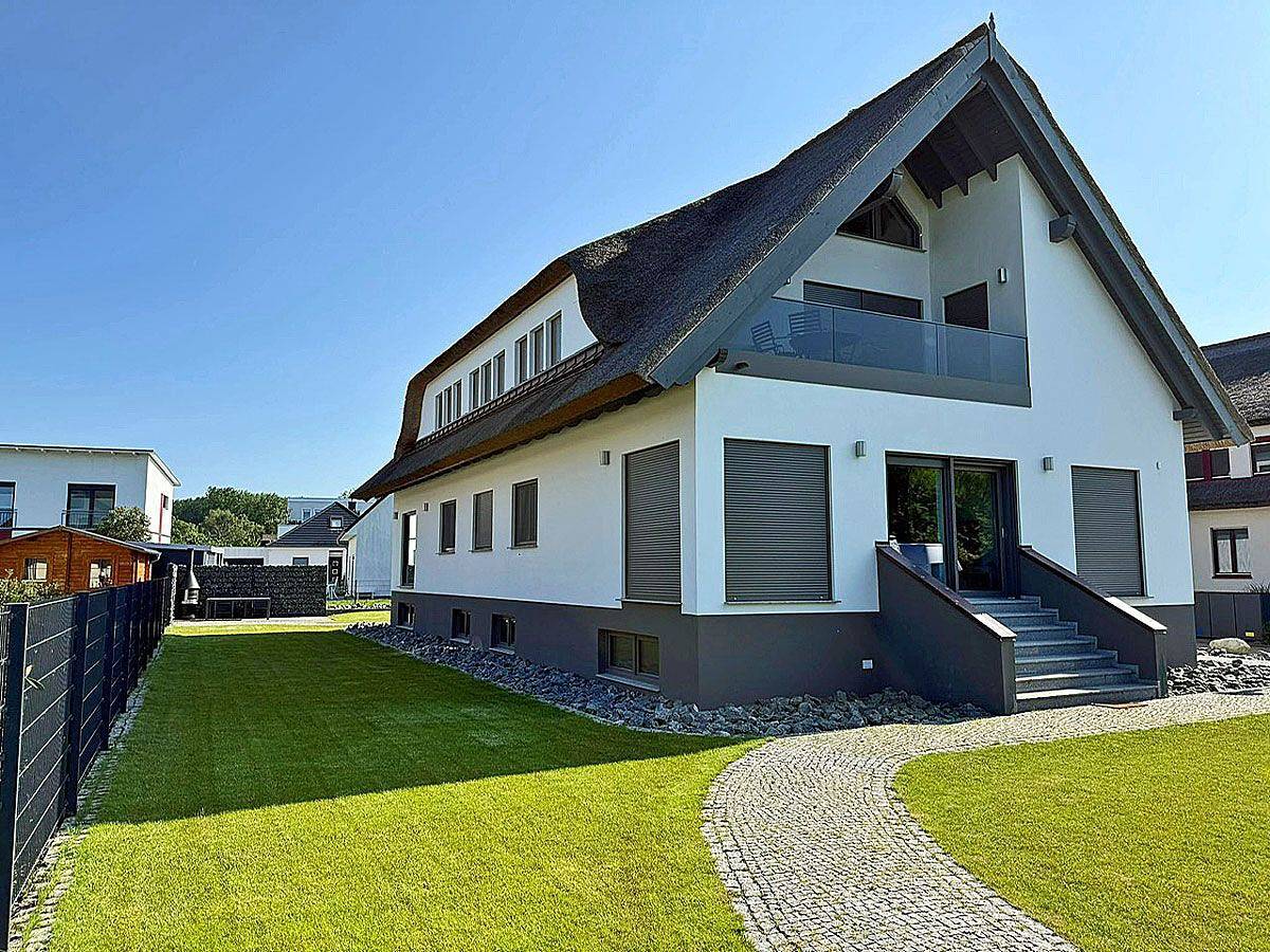 Apartamento entero, Moderne Fewo mit Kamin, ca. 1300m zum Sandstrand, 3 Schlafzimmer bis 6 Personen in Glowe, Rügen