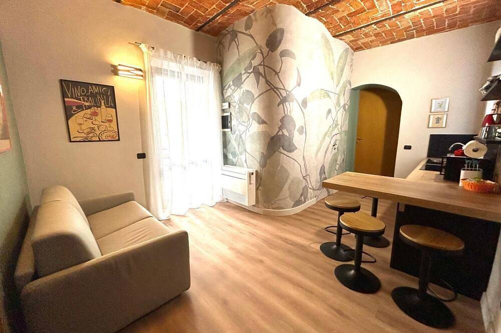 Appartement entier, Apartment with parking space located in the heart of the historic center in Alba (Piemont), Langhe