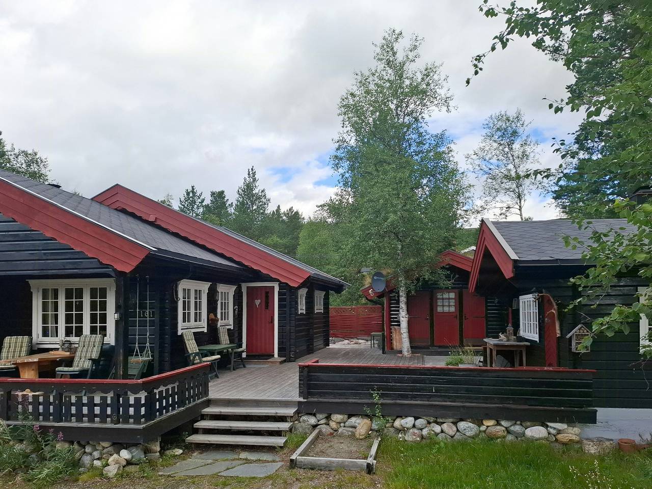 Familienhütten bei einem Wasserfall in Bjorli in Bjorli, Lesja