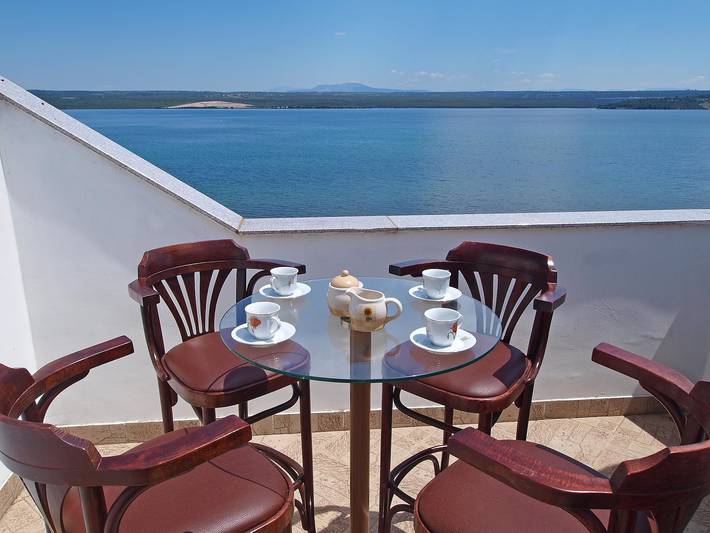 Ferienwohnung für 5 Personen, mit Balkon und Garten sowie Seeblick