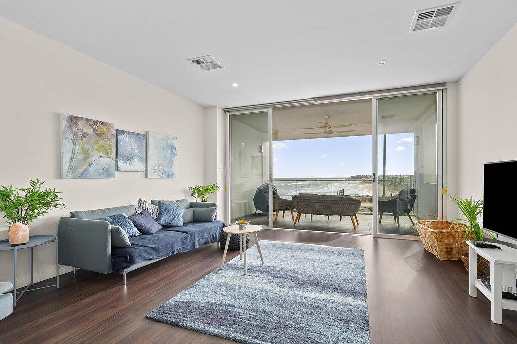 Meander ~ Port Noarlunga South - Perched up high on the red sandstone beach cliffs, your vantage point offers unrivalled views of where the Onkaparinga River meets the sea – just outside your front door. in Aldinga Beach, City of Onkaparinga