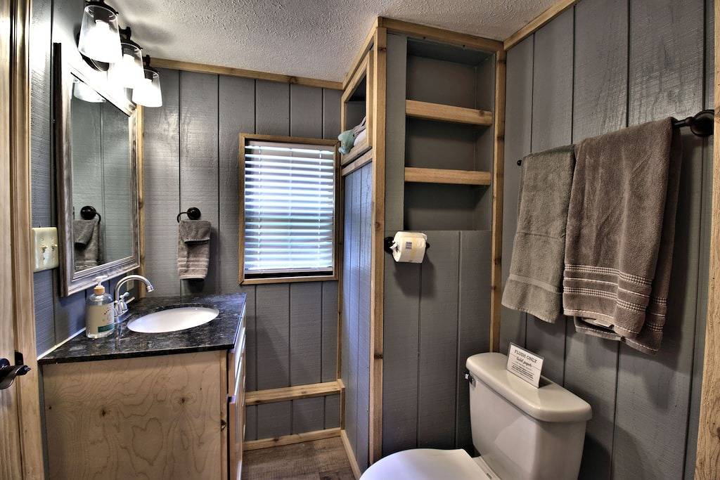 Moonshine Cabin with a nice yard on the creek in the shadows of the Smokies in Cocke County