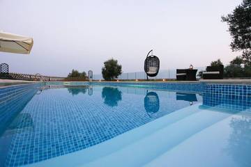 Villa mit pool für 10 Personen, mit Garten auf Skiathos