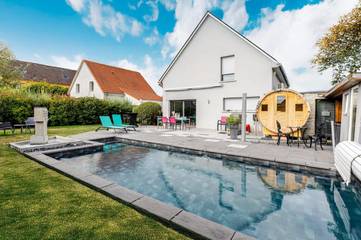 Location de vacances pour 8 personnes, avec jacuzzi ainsi que jardin et piscine à Furdenheim