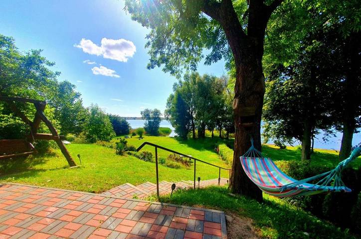 Ferienhaus für 8 Personen, mit Garten und Ausblick sowie Terrasse und Seeblick - 1