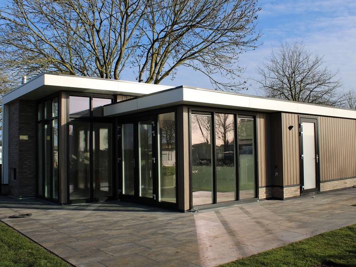 Ferienhaus für 4 Personen, mit Terrasse und Garten sowie Pool und Sauna