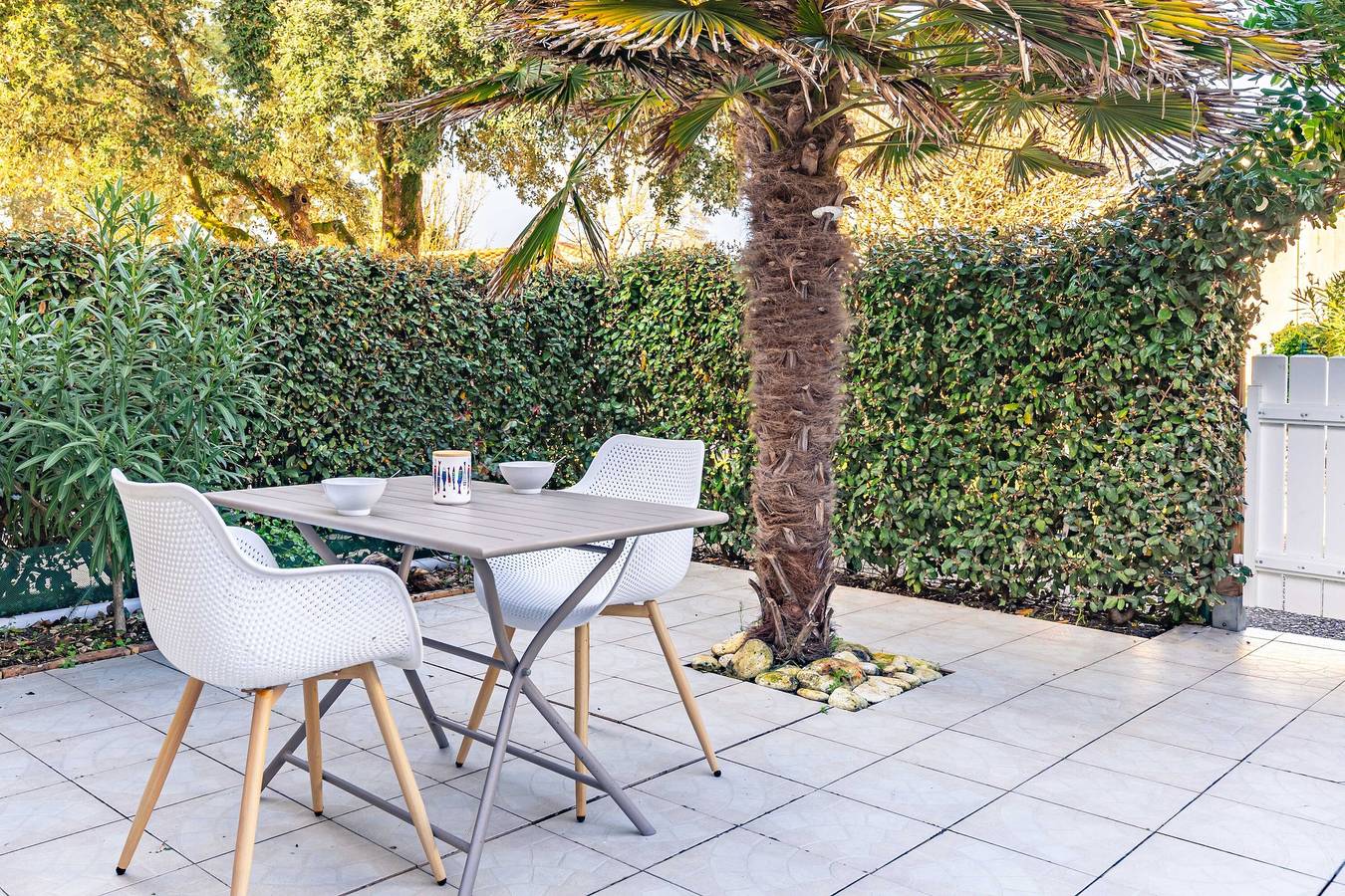 Das kleine Haus mit seiner Palme in Dolus-d'Oléron, Côte de Beauté