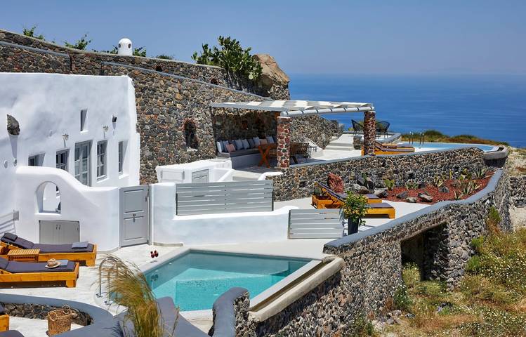 Villa pour 8 personnes, avec terrasse ainsi que vue sur l’océan et jardin dans Firostefani