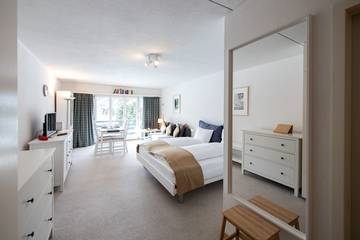Cottage pour 2 personnes, avec vue ainsi que jardin et balcon à Davos