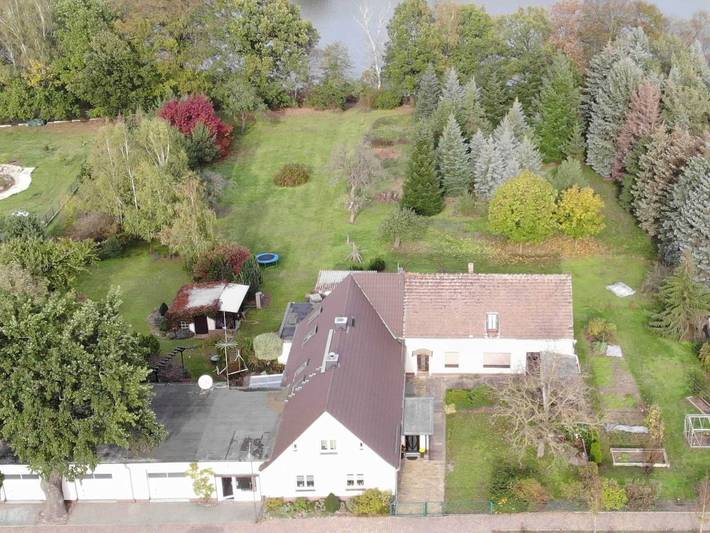 Ferienwohnung für 4 Personen, mit Seeblick und Garten in Dreiheide