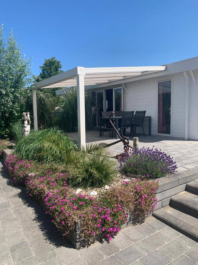 Ferienhaus für 4 Personen, mit Garten und Ausblick sowie Kinderpool, mit Haustier in Zeeland