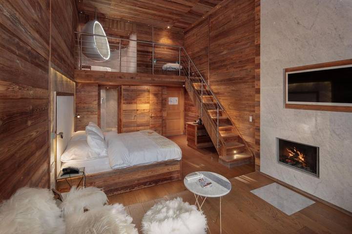 Hôtel pour 6 personnes, avec piscine et jardin ainsi que vue et sauna, animaux acceptés à Crans-Montana