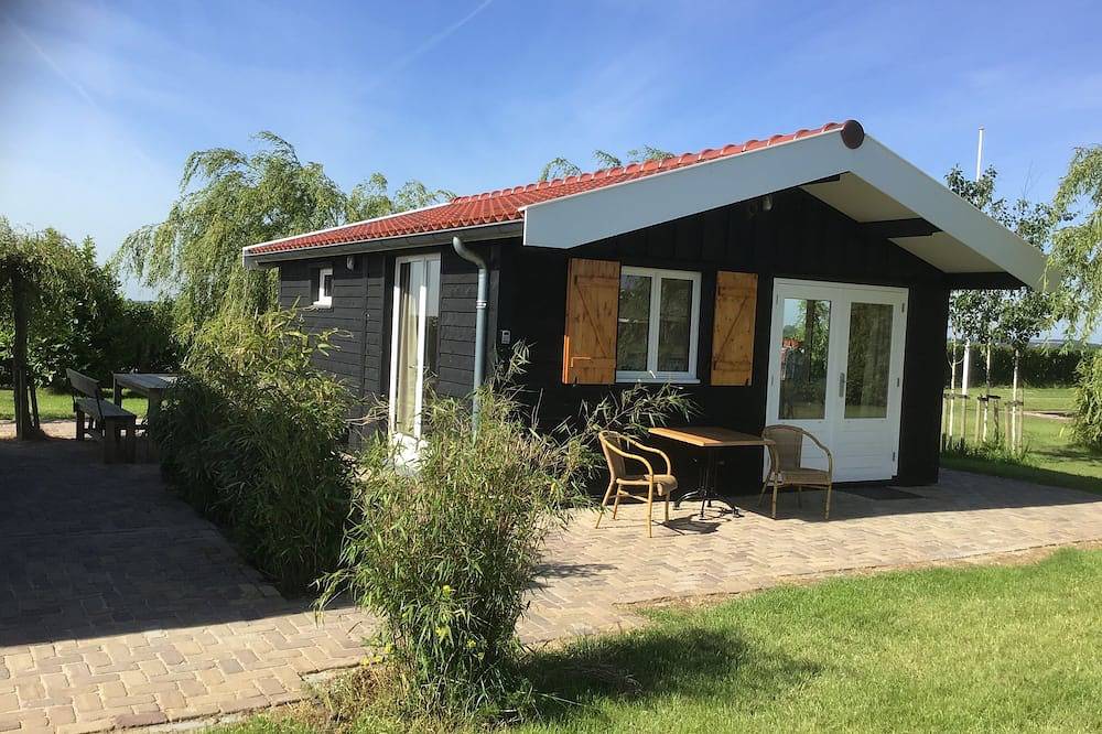 Verbringen Sie die Nacht auf dem Wasser im Tiny House / Trekkershut Comfort / Mini Bungalow in Leimuiden, Groene Hart