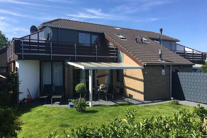 Ferienhaus für 4 Personen, mit Balkon und Garten
