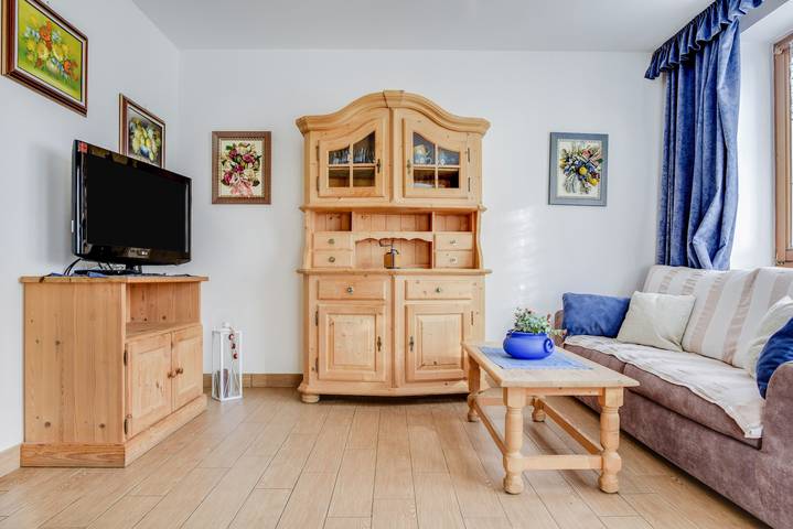 Apartamento entero, Encantador apartamento "Villetta Crepaz" con vistas a la montaña, balcón, terraza y jardín in Canazei, Dolomiti Superski