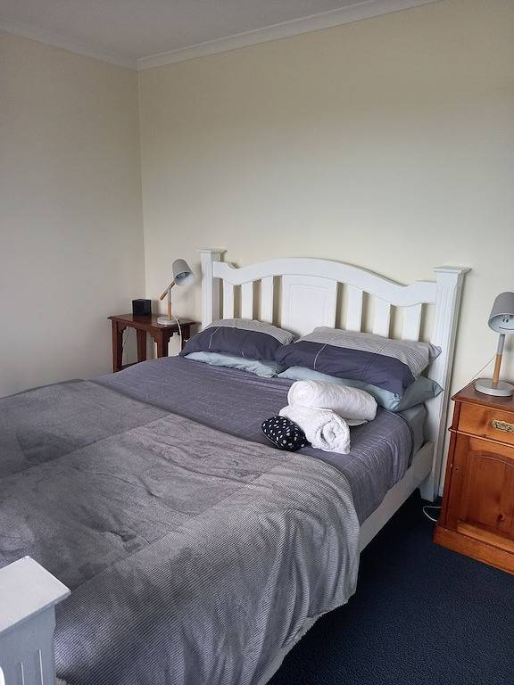  A two- story house with sweeping views of Bass Strait and  the North Arm.   in Lakes Entrance, East Gippsland Shire
