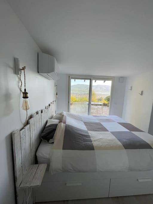Appartement de vacances pour 2 personnes, avec Terrasse ainsi que Piscine et Vue