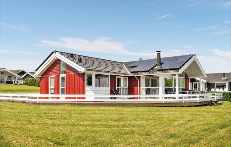 Ferienhaus für 8 Personen, mit Terrasse und Whirlpool sowie Garten und Sauna in Mommark