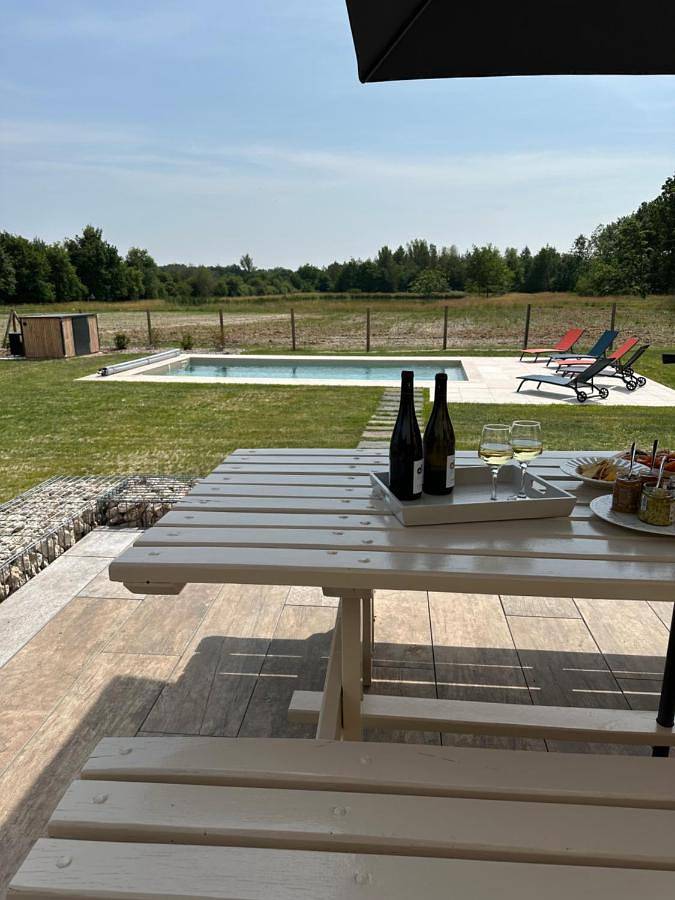 Location de vacances pour 12 personnes, avec Terrasse ainsi que Jardin et Piscine à Fontaines-en-Sologne