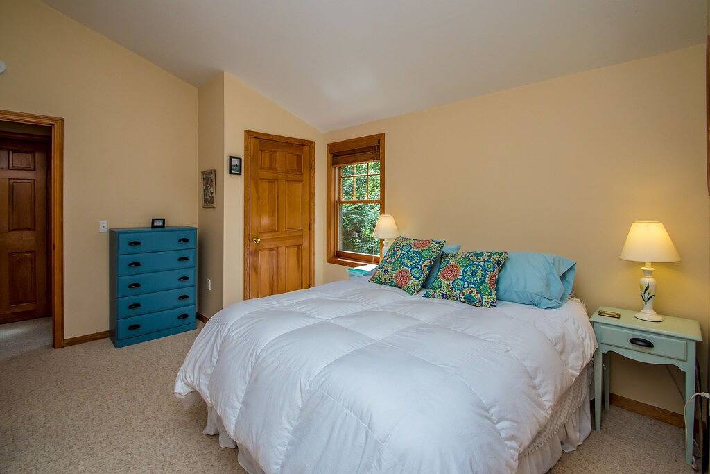 Waterfront home in Moultonborough with sandy beach and dock in Moultonborough, Lake Winnipesaukee