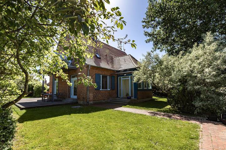 Ferienwohnung für 4 Personen, mit Sauna und Seeblick sowie Ausblick und Garten in Wustrow