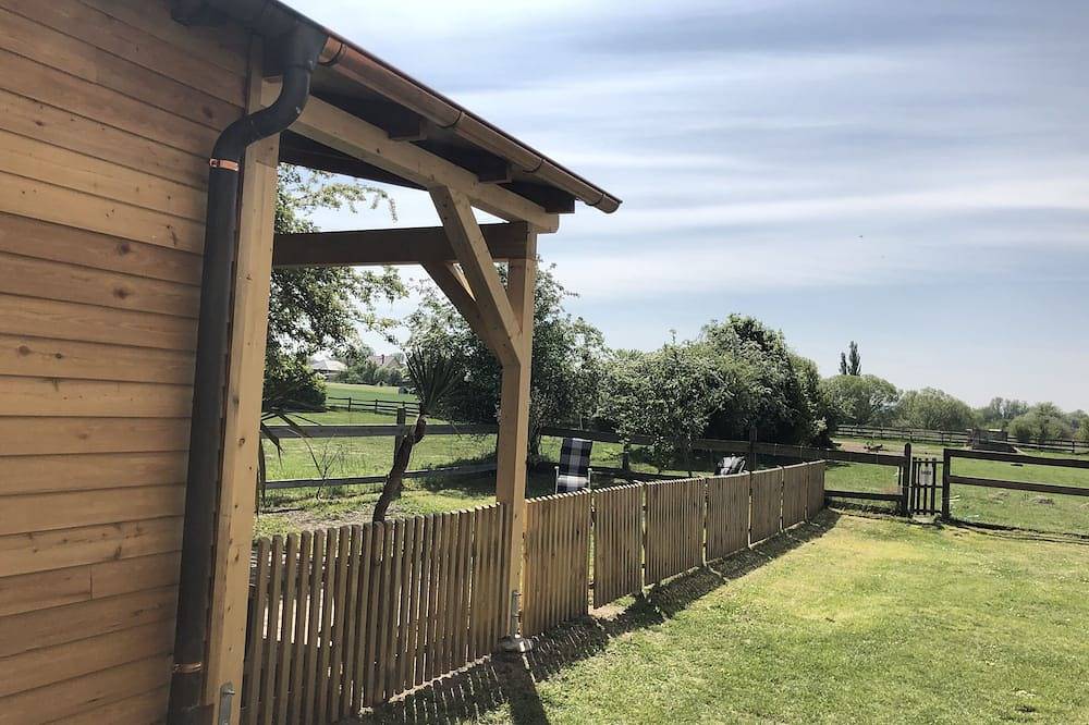 Idyllisches Holzhaus mit eigenem Garten direkt am See in Havelsee, Westhavelland