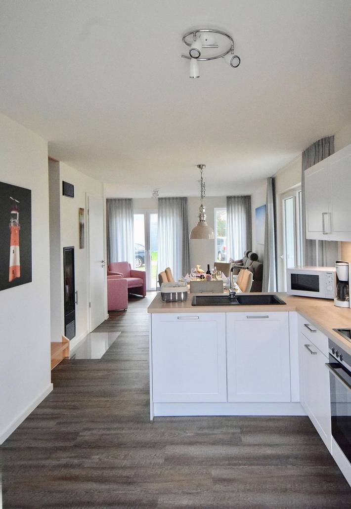 Ferienhaus mit Meerblick für 6 Personen, mit Ausblick und Balkon sowie Sauna in Schillig - 2