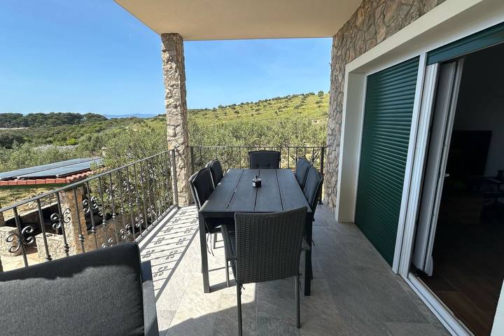 Ferienhaus für 8 Personen, mit Balkon/Terrasse auf Pasman