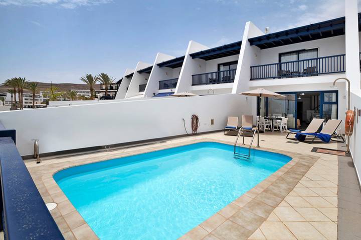 Villa "Malvasia 22" mit Meerblick, beheiztem Pool, Balkon, Klimaanlage und Wlan in Puerto Calero, Yaiza