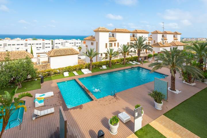 Ferienwohnung für 6 Personen, mit Garten und Pool, kinderfreundlich in Guardamar del Segura