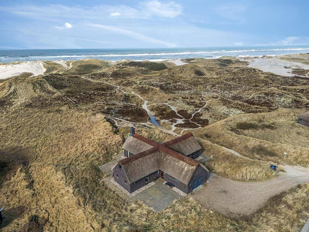 Architecturally beautiful holiday home in an exclusive location in Søndervig, Holmsland Klit