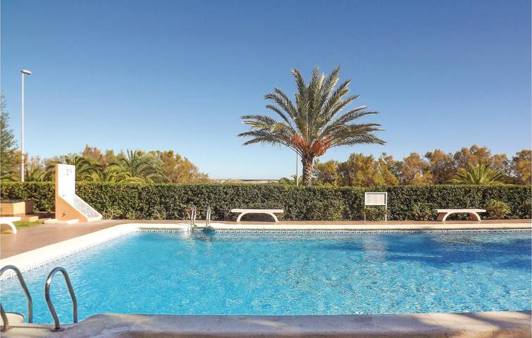 Apartamento vacacional entero, Apartamento junto a la playa con piscina y terraza in Platja de Terranova (Piles), Piles